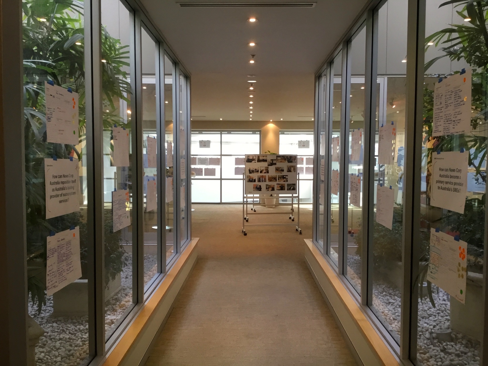 A corridor at News Corp Australia lined with completed idea sheets